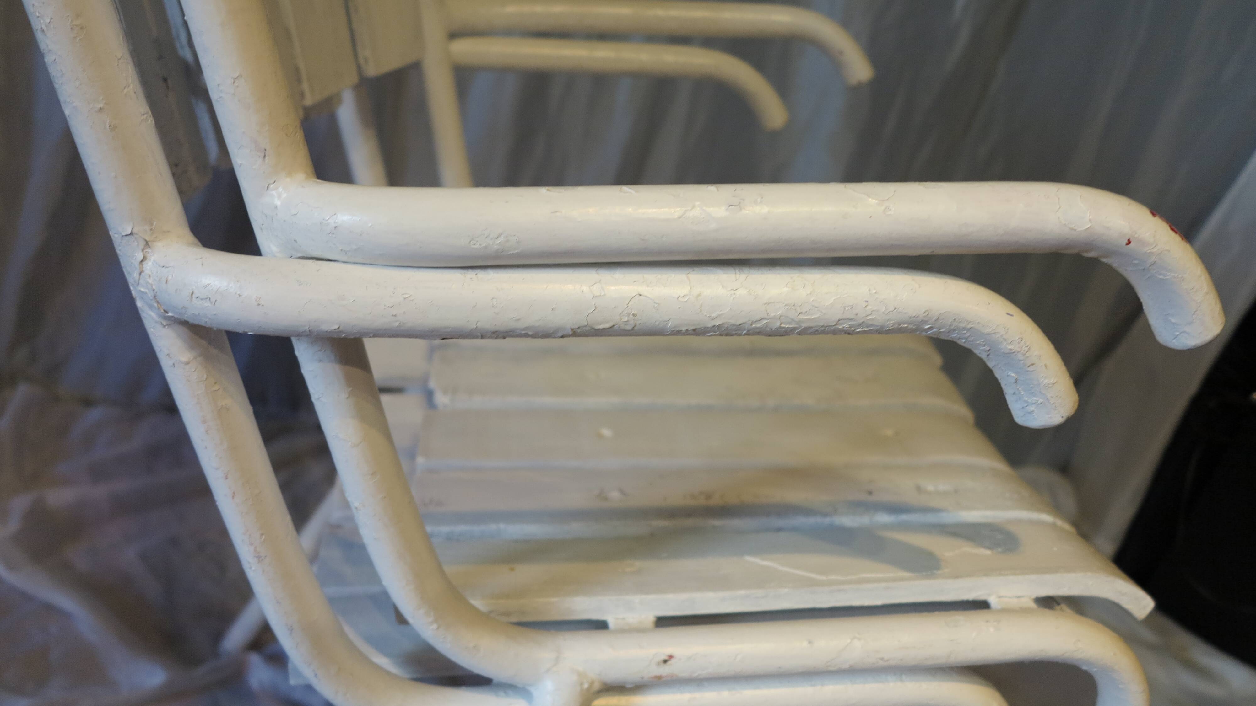 Pair of white garden armchairs