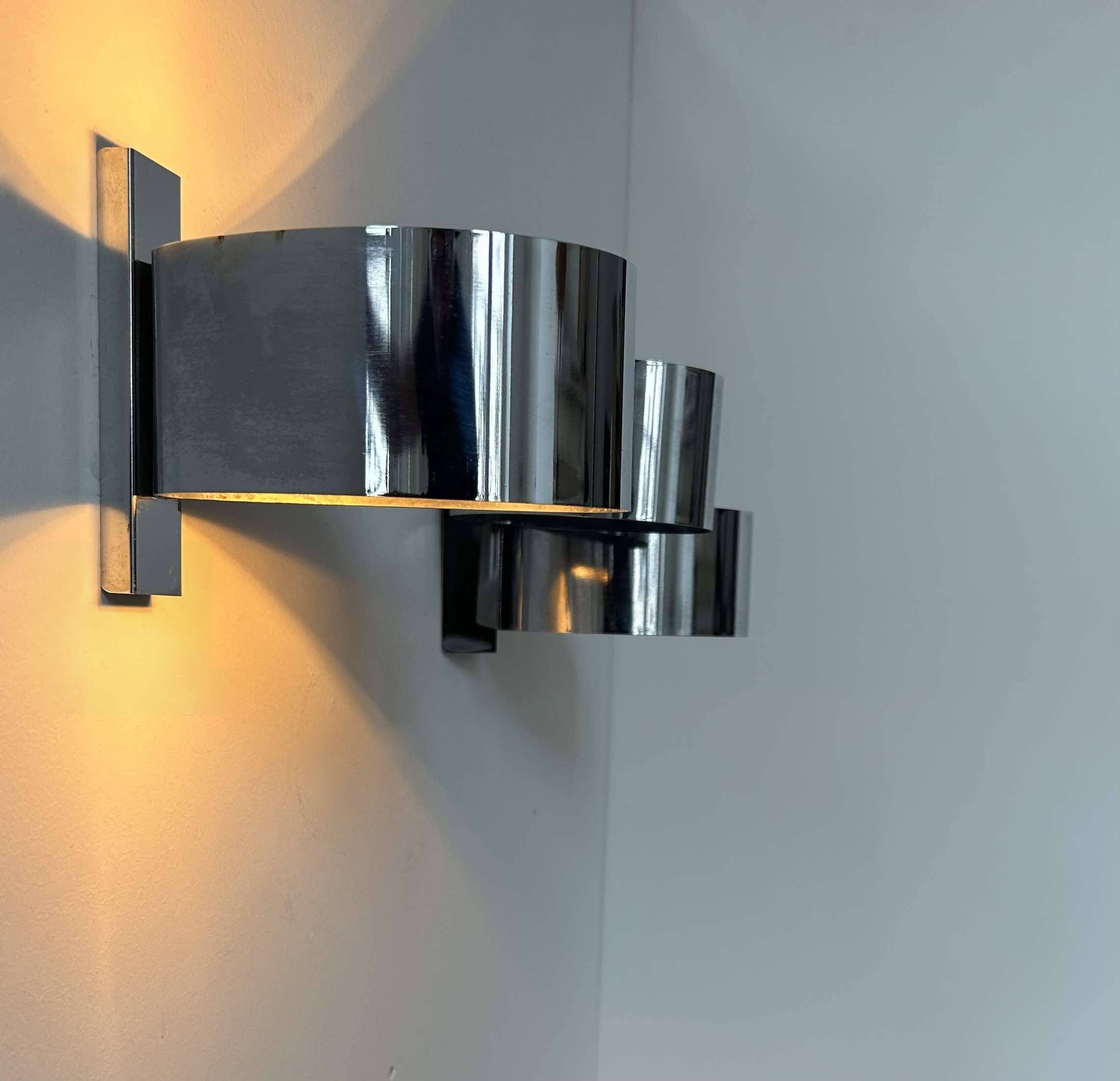 Pair of vintage wall lights, curved chrome metal, France 1970