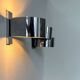Pair of vintage wall lights, curved chrome metal, France 1970