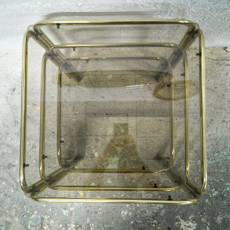 Trio of gilded metal trundle tables