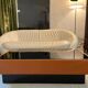 Caramel leather and black glass coffee table
