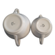 1 milk jug and 1 sugar jar