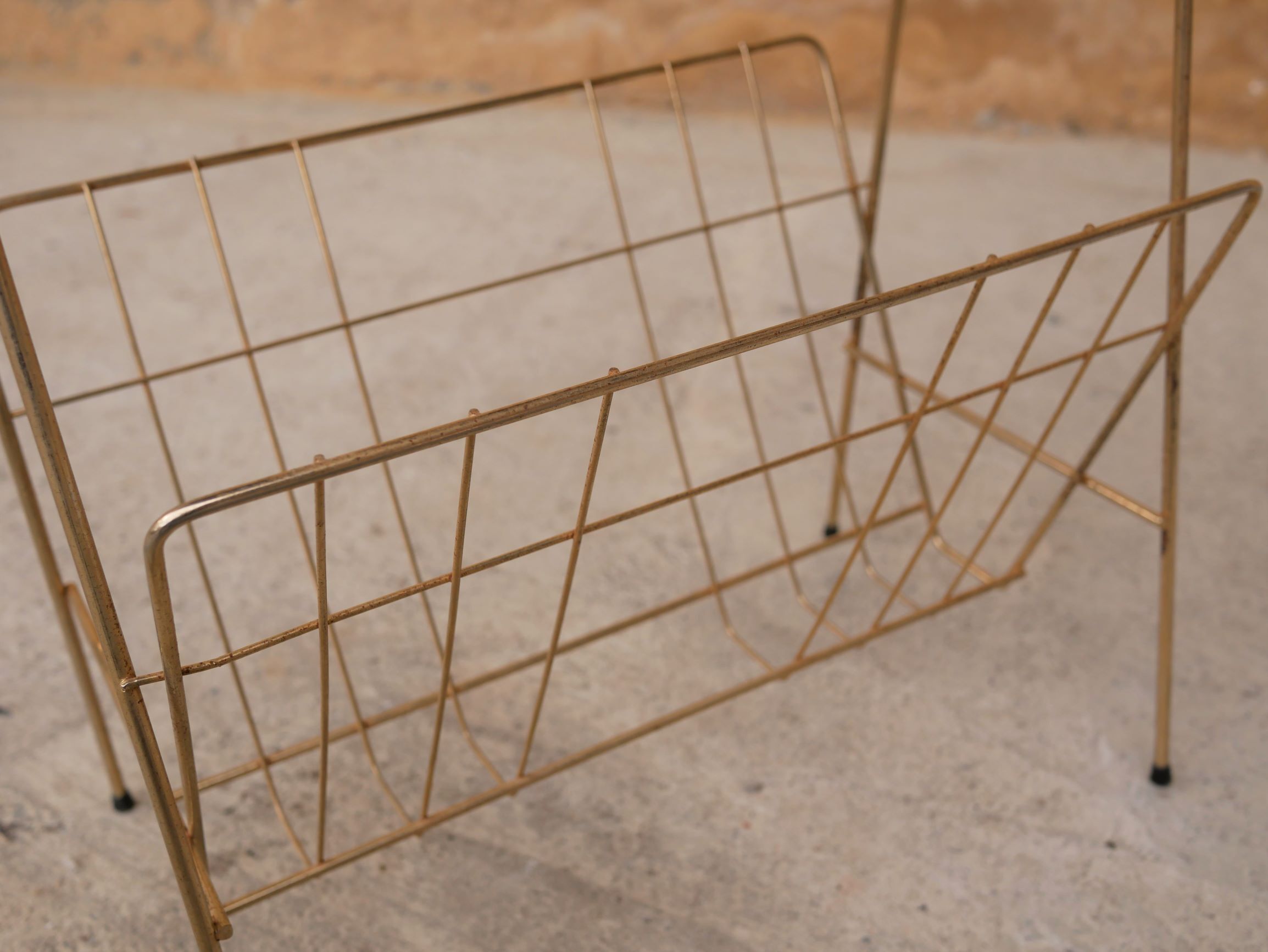 Vintage gold metal magazine rack