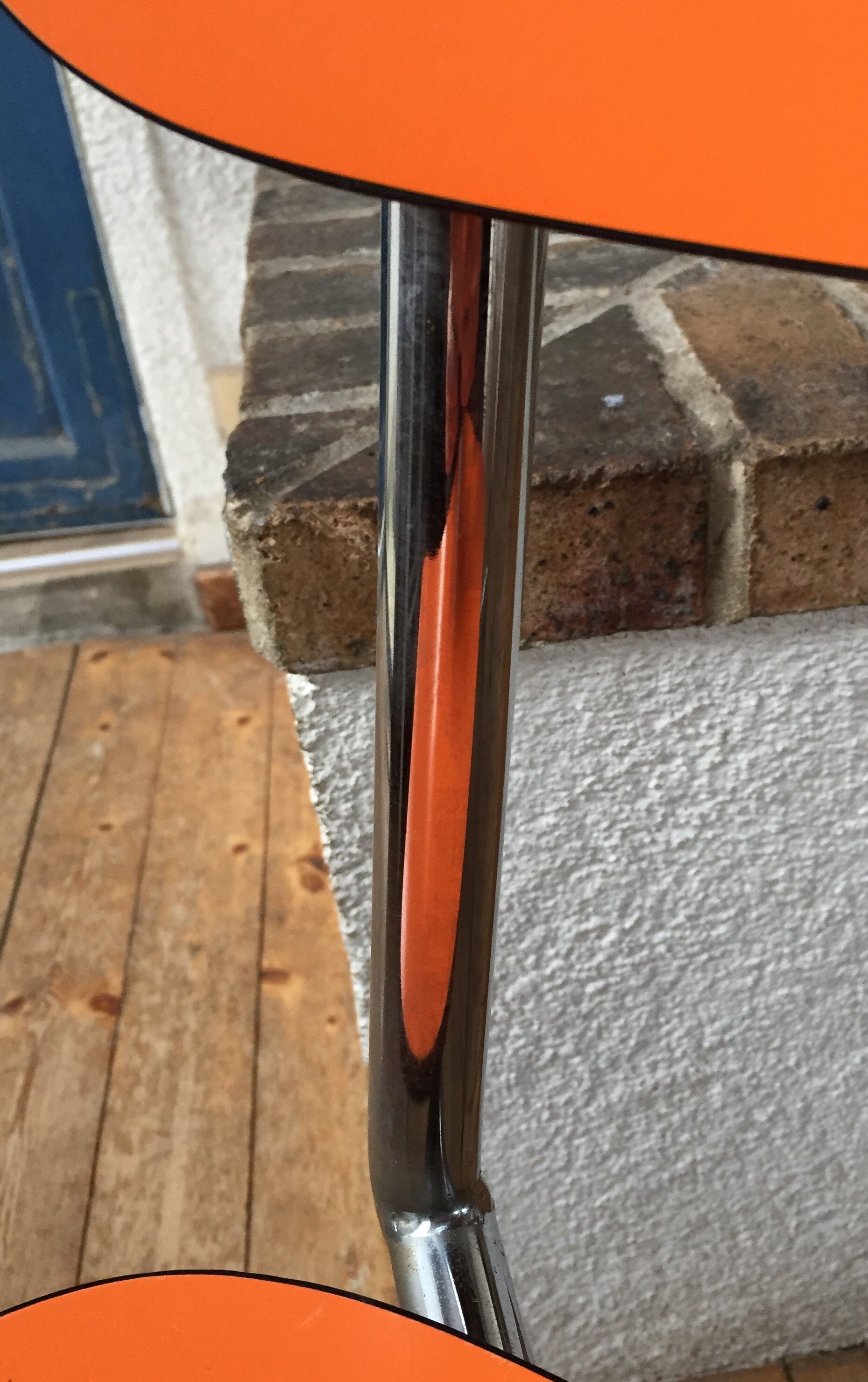 Lot of 4 vintage chairs in orange formica