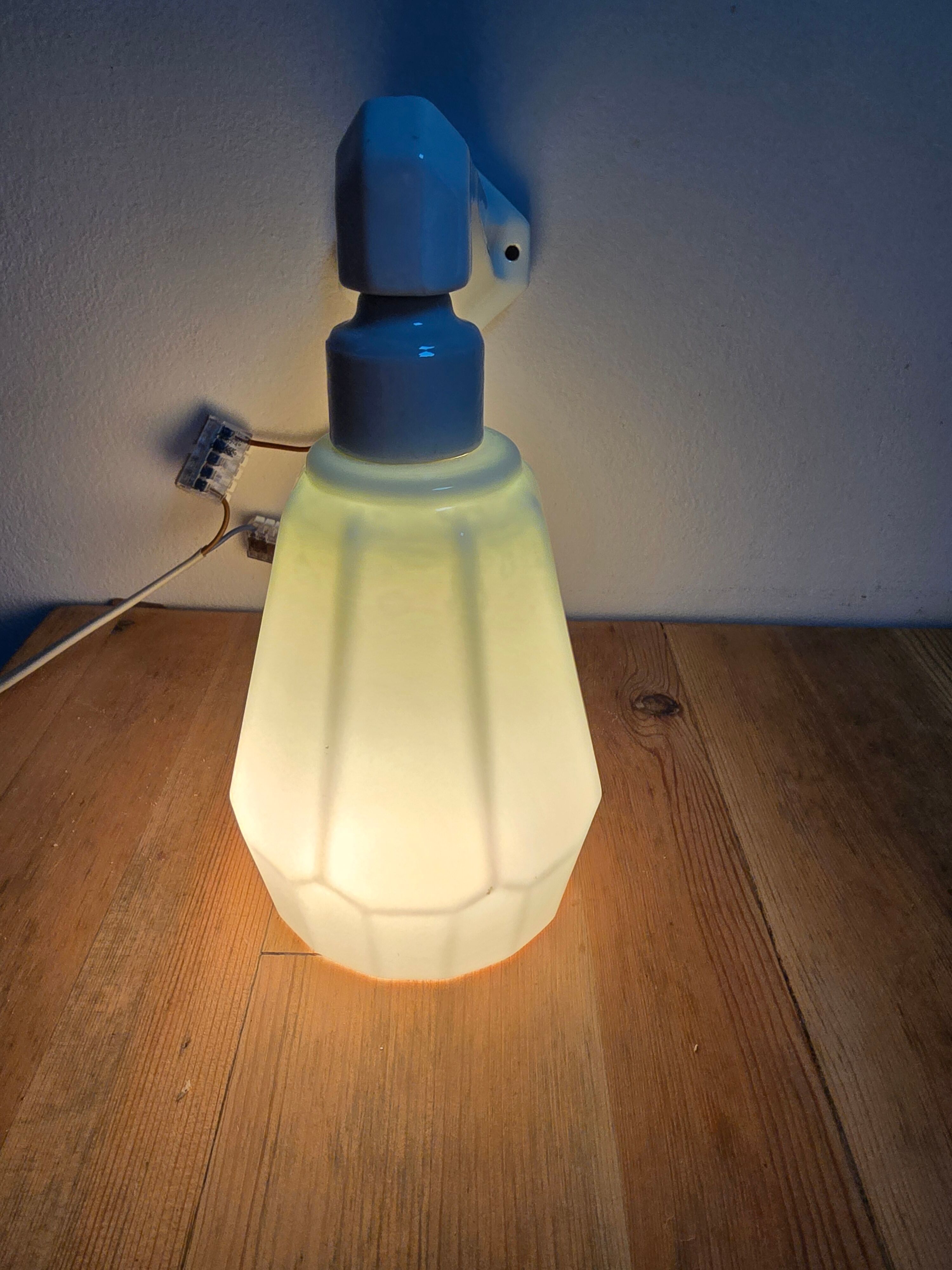 Antique wall sconce in porcelain