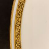8 flat porcelain plates from Limoges Bernardaud, gilded Greek decoration, twentieth century