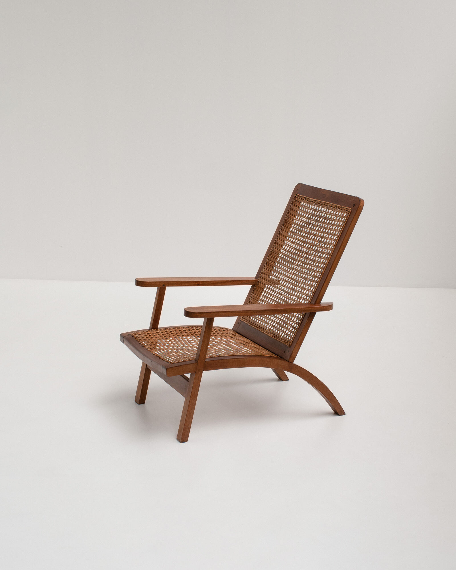 pair of french mahogany and cane armchairs, 1950s