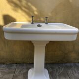 Antique washbasin on ceramic column