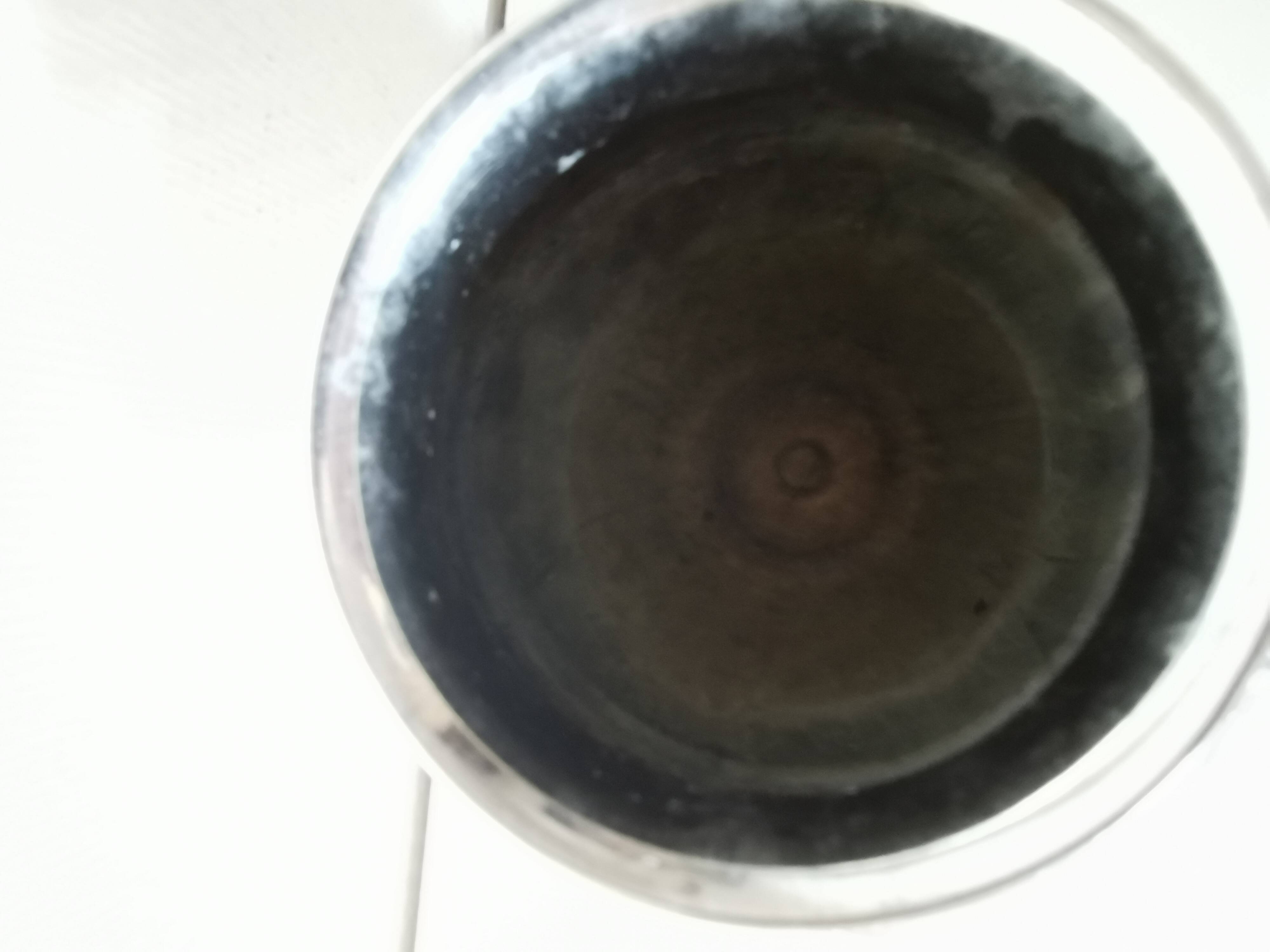 metal vase, flowers in relief