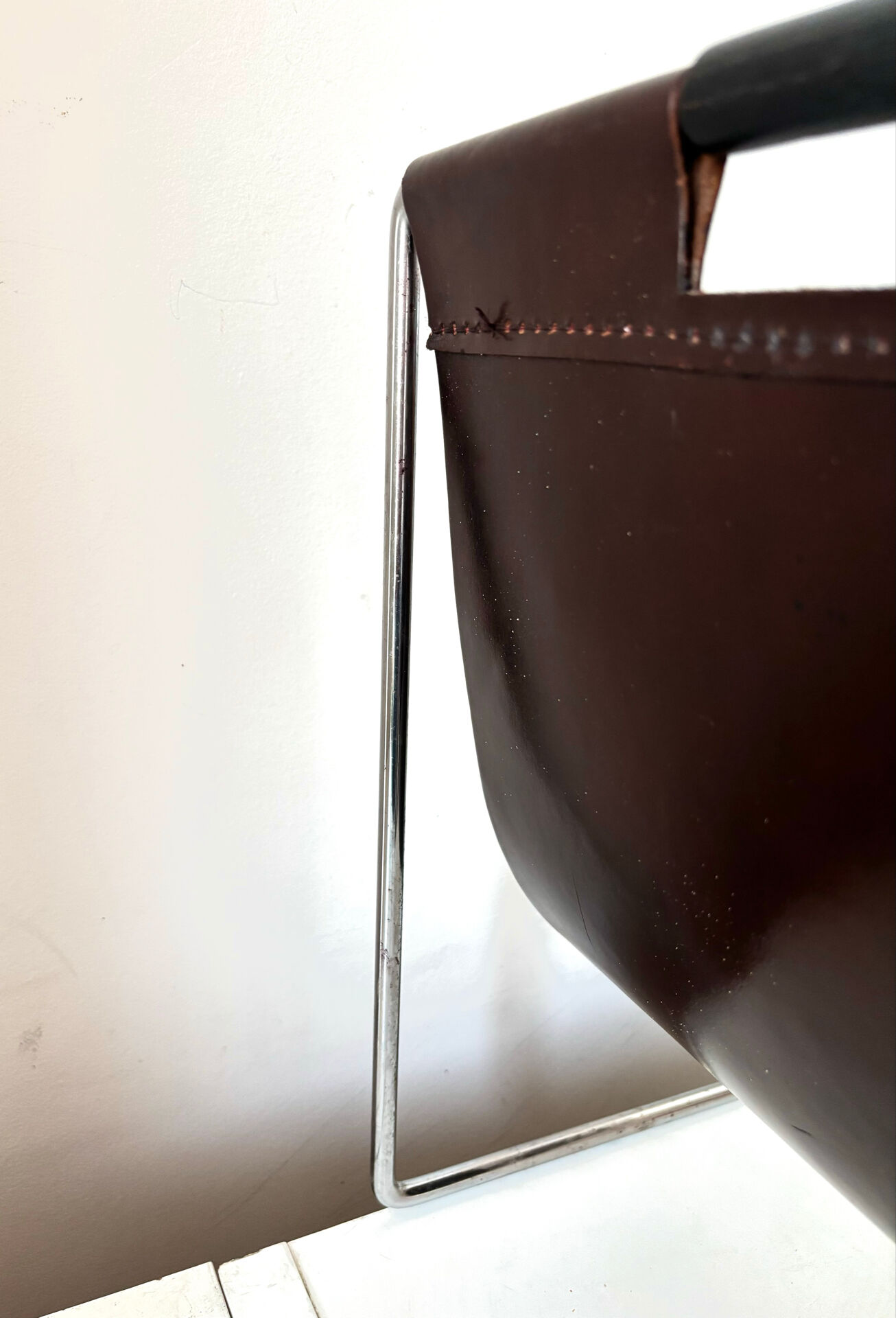 Leather and chrome magazine rack Brabantia