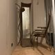 Dressing table coat rack by Roger Landault with its chair.