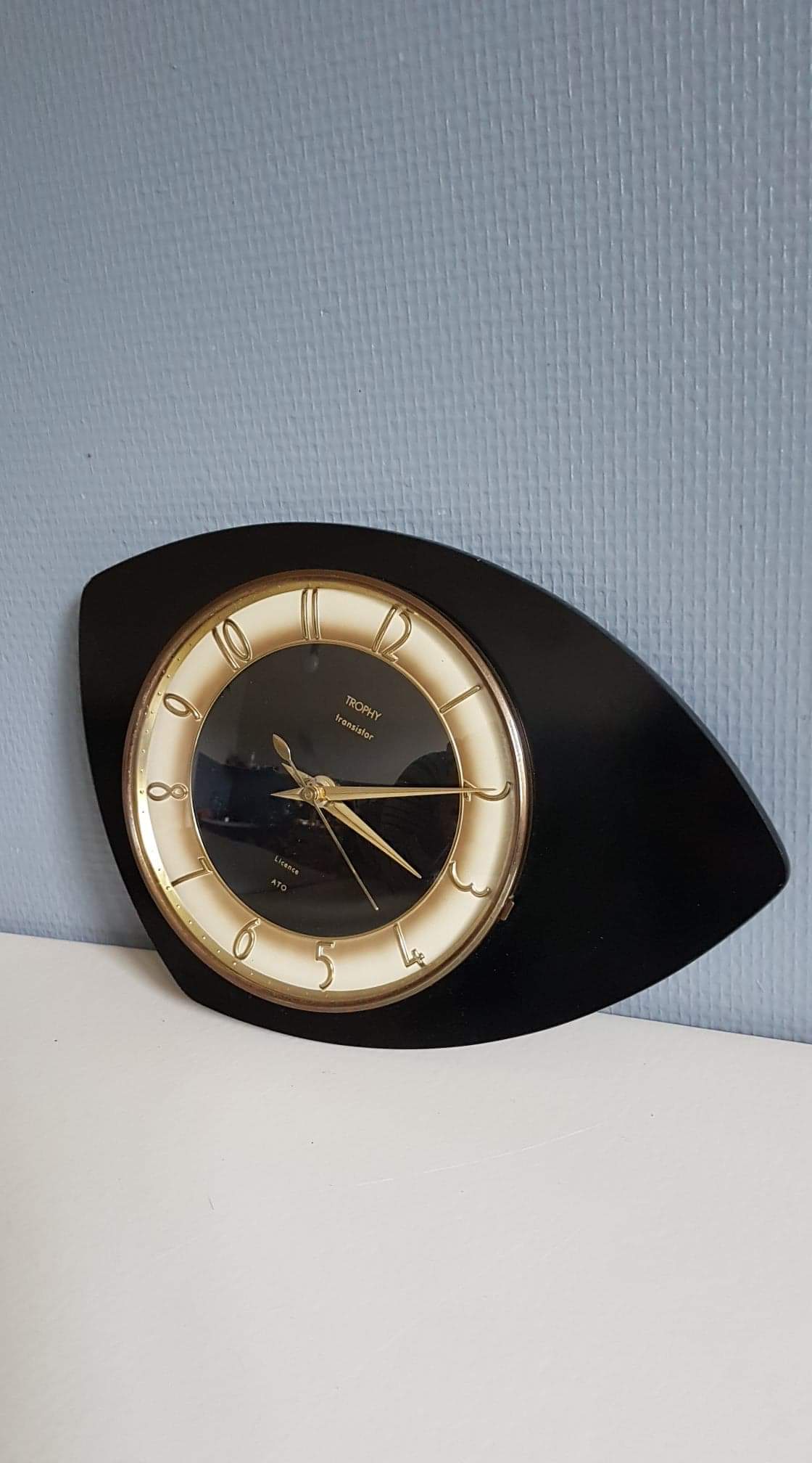Black and gold formica wall pendulum mark Trophy Transistor