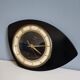 Pendule murale formica noire et or marque Trophy Transistor