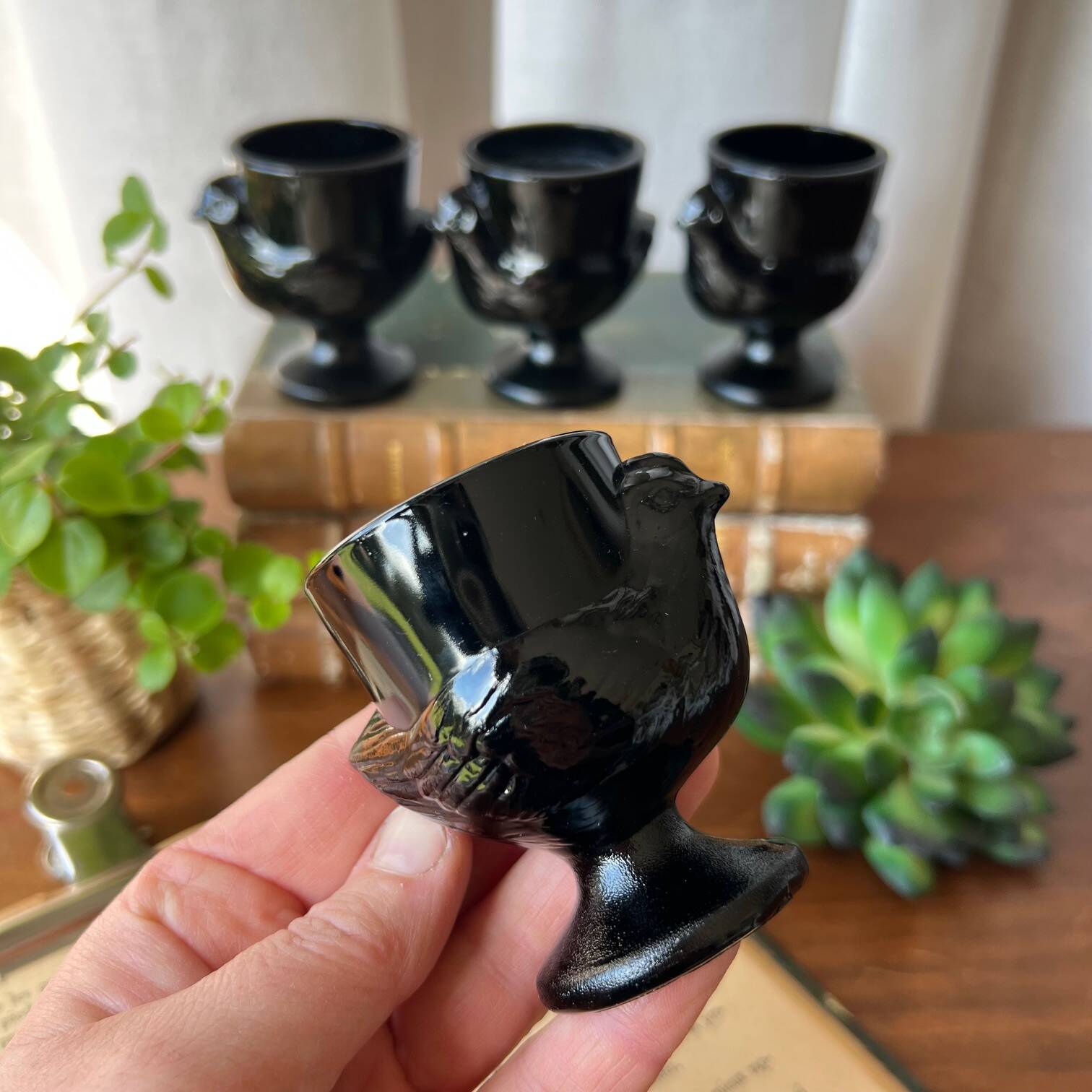 4 "hen" egg cups in black opaline