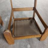 Armchairs in leather and vintage wood 70's