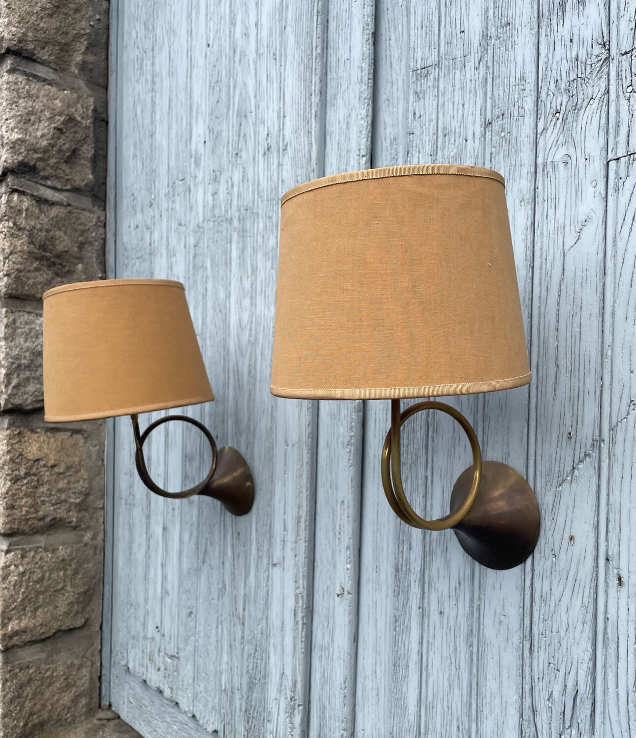 Two cornet-shaped wall lights