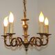 Vintage French traditional style bronze chandelier with 5 lights featuring acanthus leaf details.