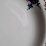 Old hollow plates mismatched in earthenware with gilded edges