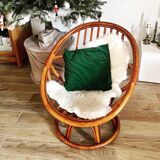Swivel rattan armchair