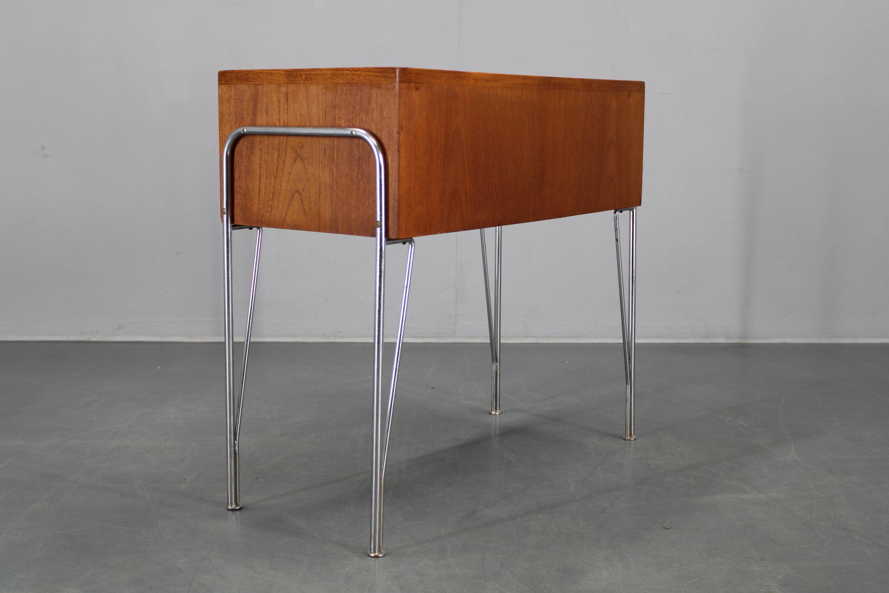 1960s Danish teak shelf cabinet with chrome plated legs