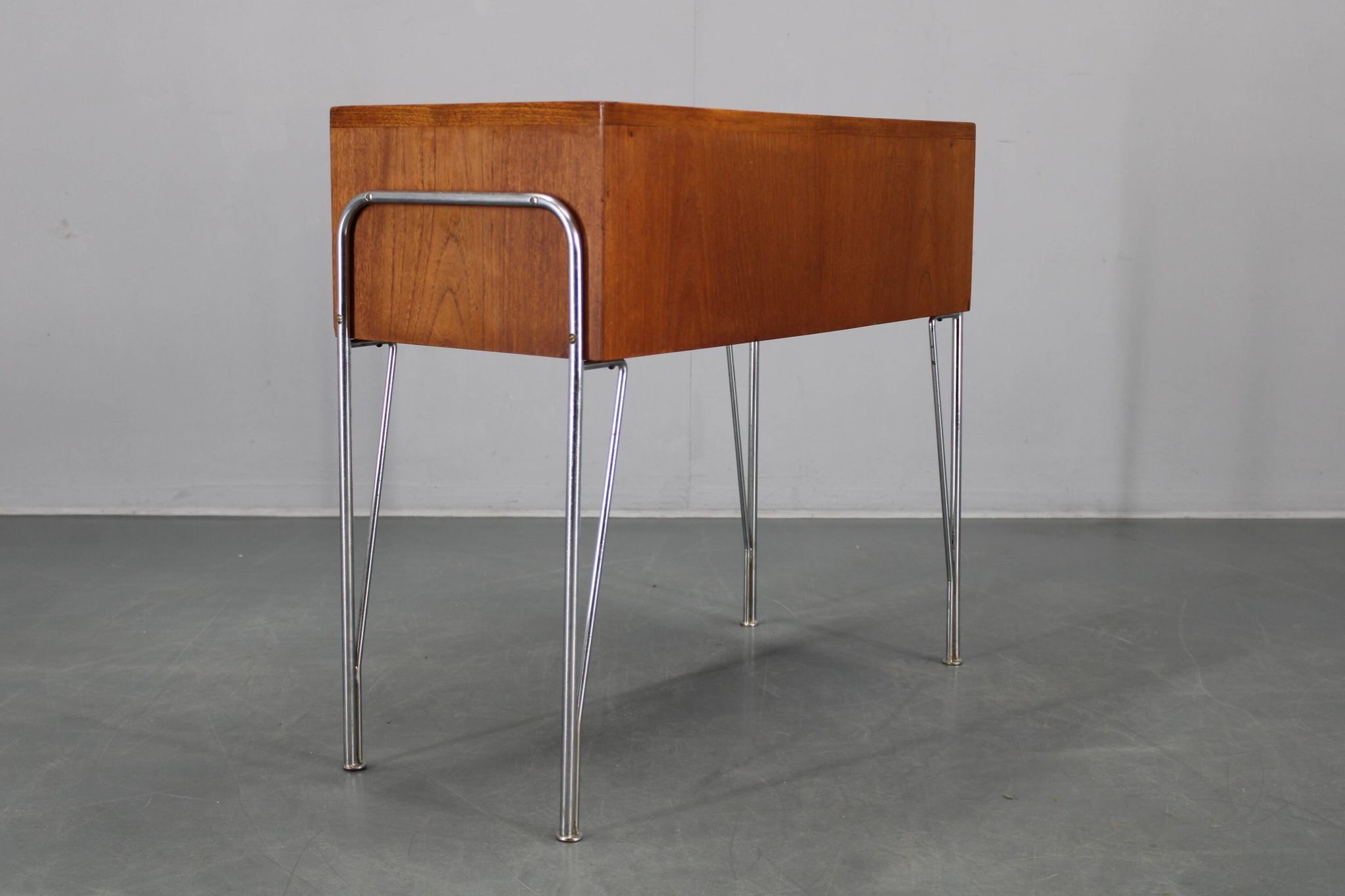 1960s Danish teak shelf cabinet with chrome plated legs