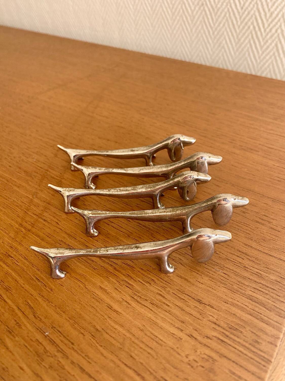 Vintage silver-plated dog knife rests
