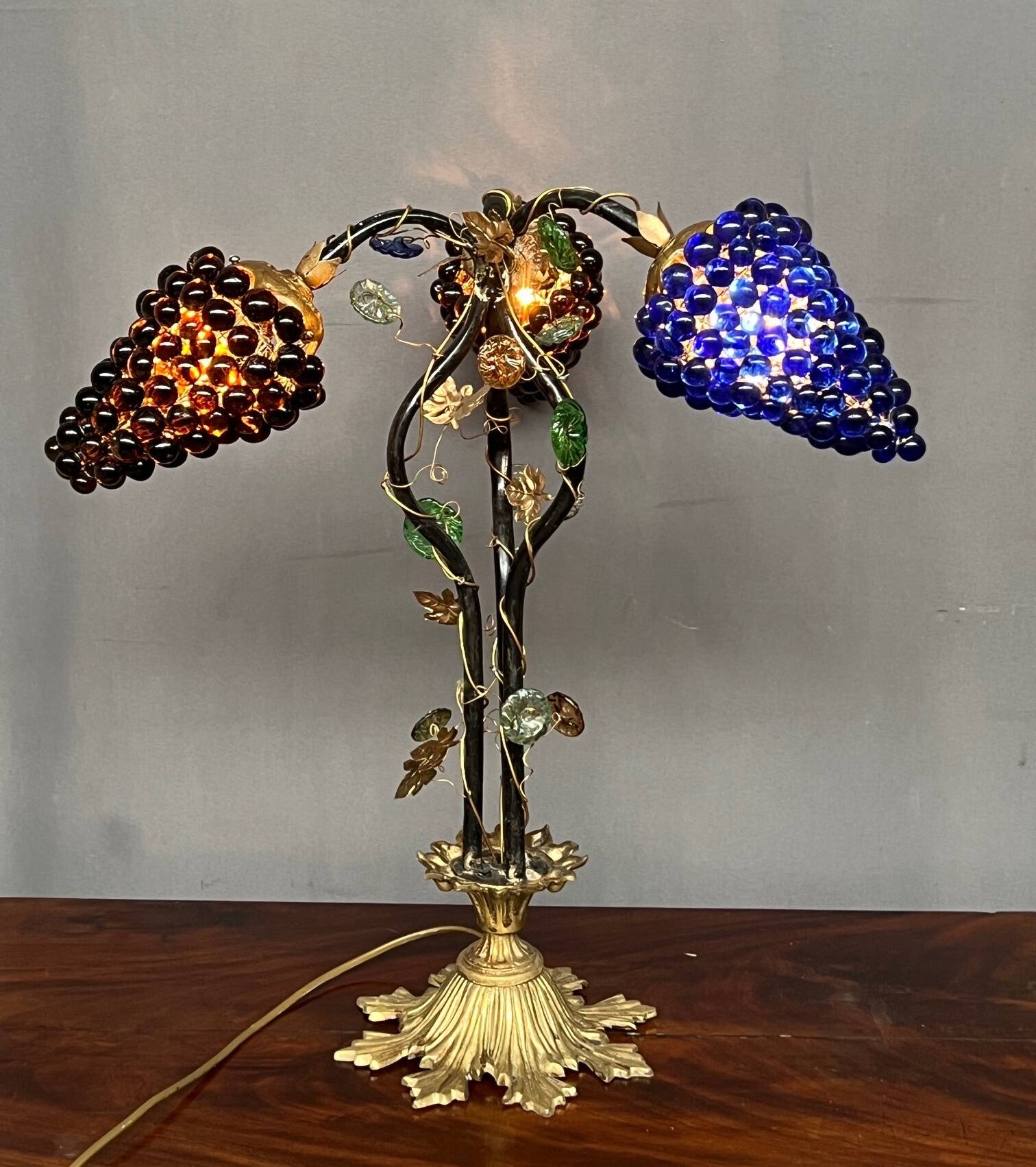 Art Nouveau table lamp with a Murano glass shade.