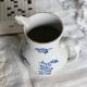 Antique Saint-Uze steel clay pitcher with cobalt blue floral pattern