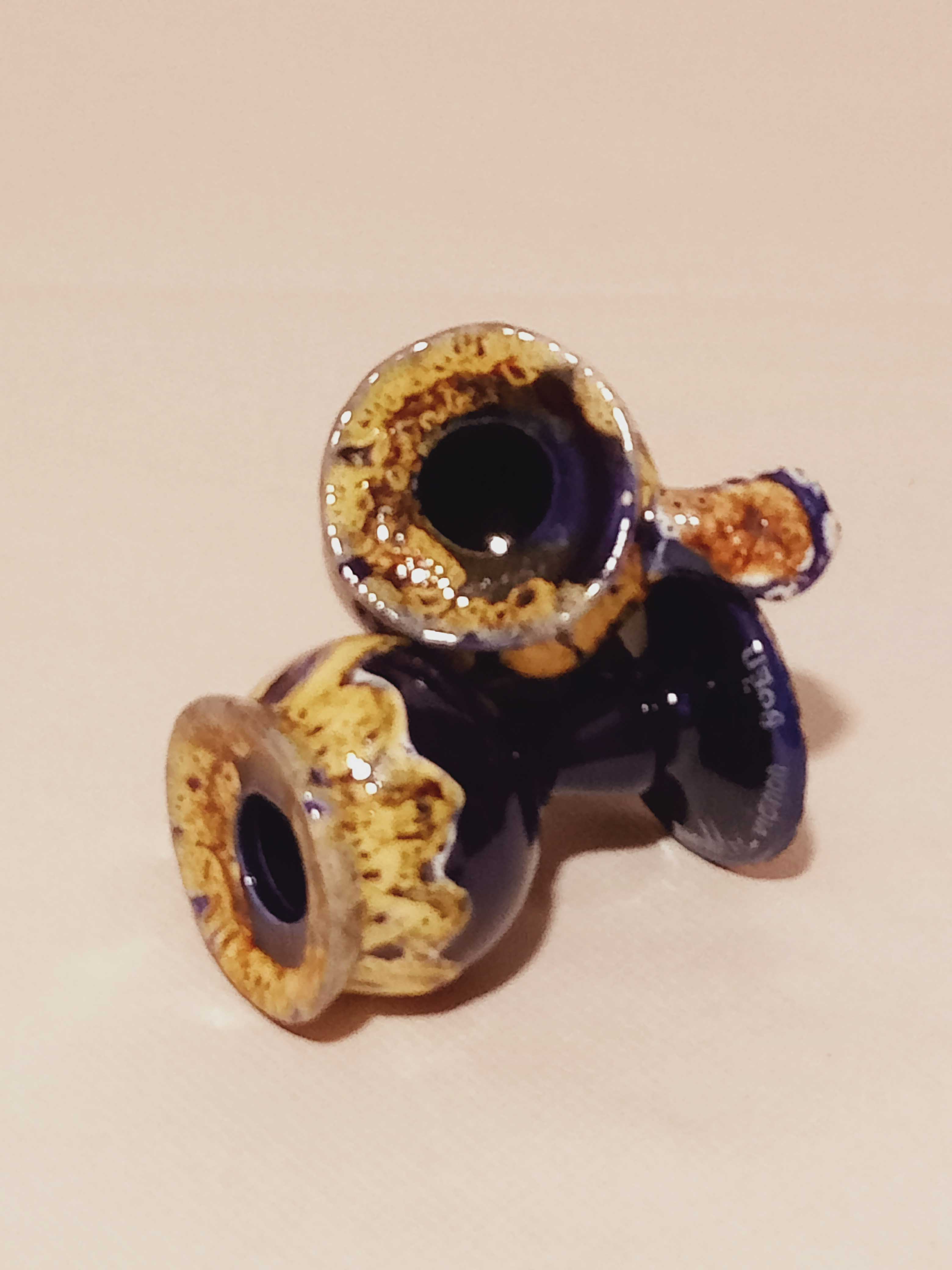 Pair of ceramic candle holders