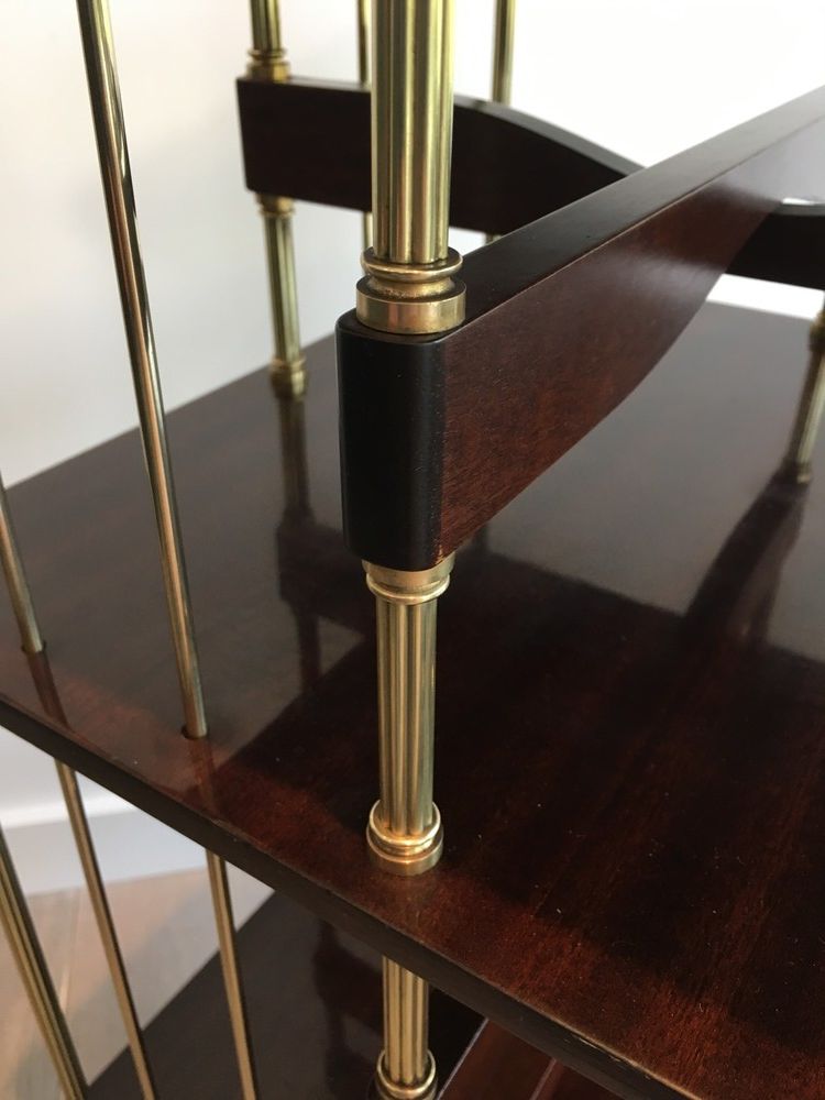 Rotating bookcase cabinet in mahogany and brass