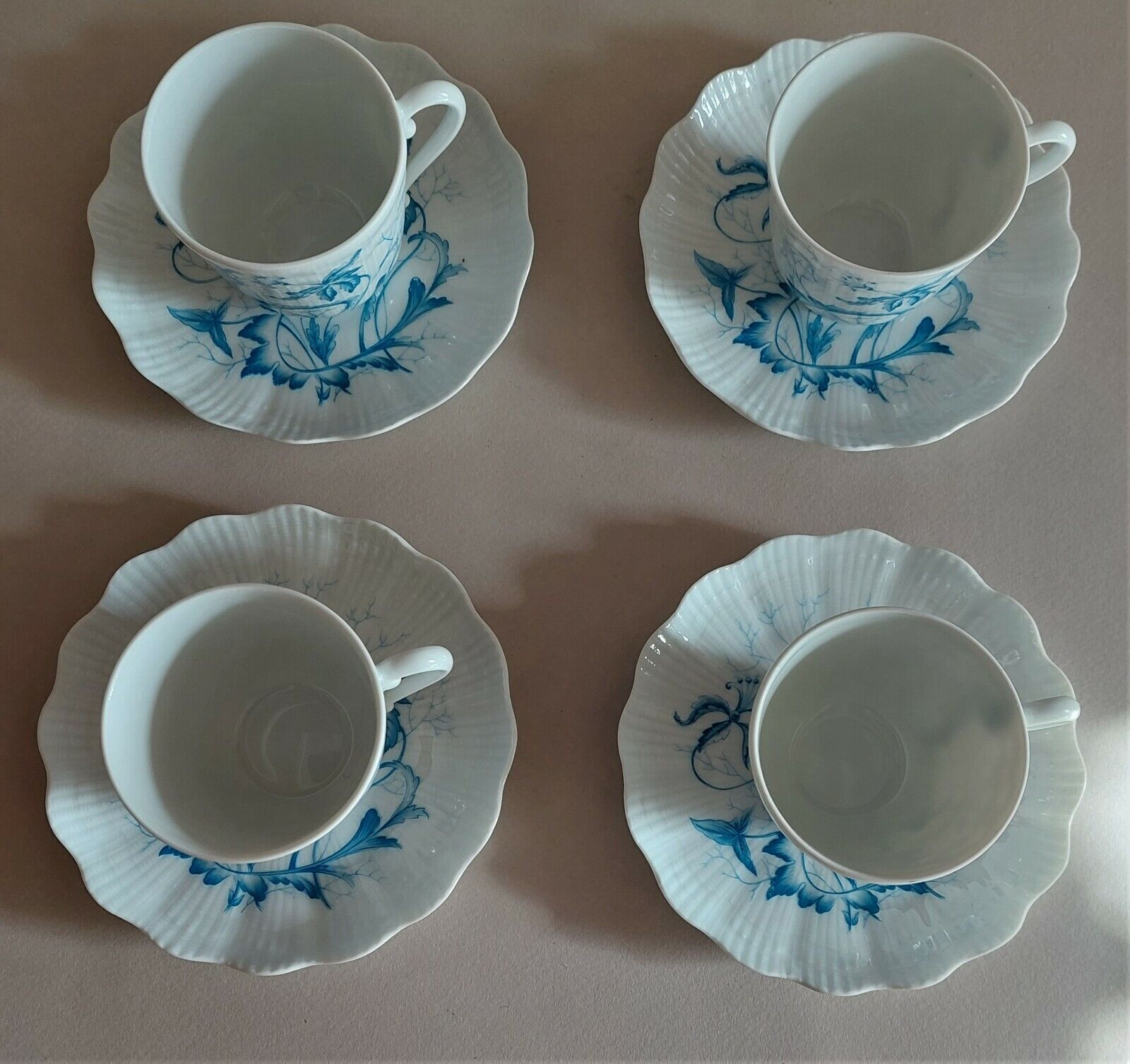 Tasses série de quatre porcelaine de Limoges Giraud