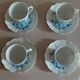 Tasses série de quatre porcelaine de Limoges Giraud