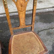 2 Art Deco chairs from the 1930s, made of solid wood with caning.
