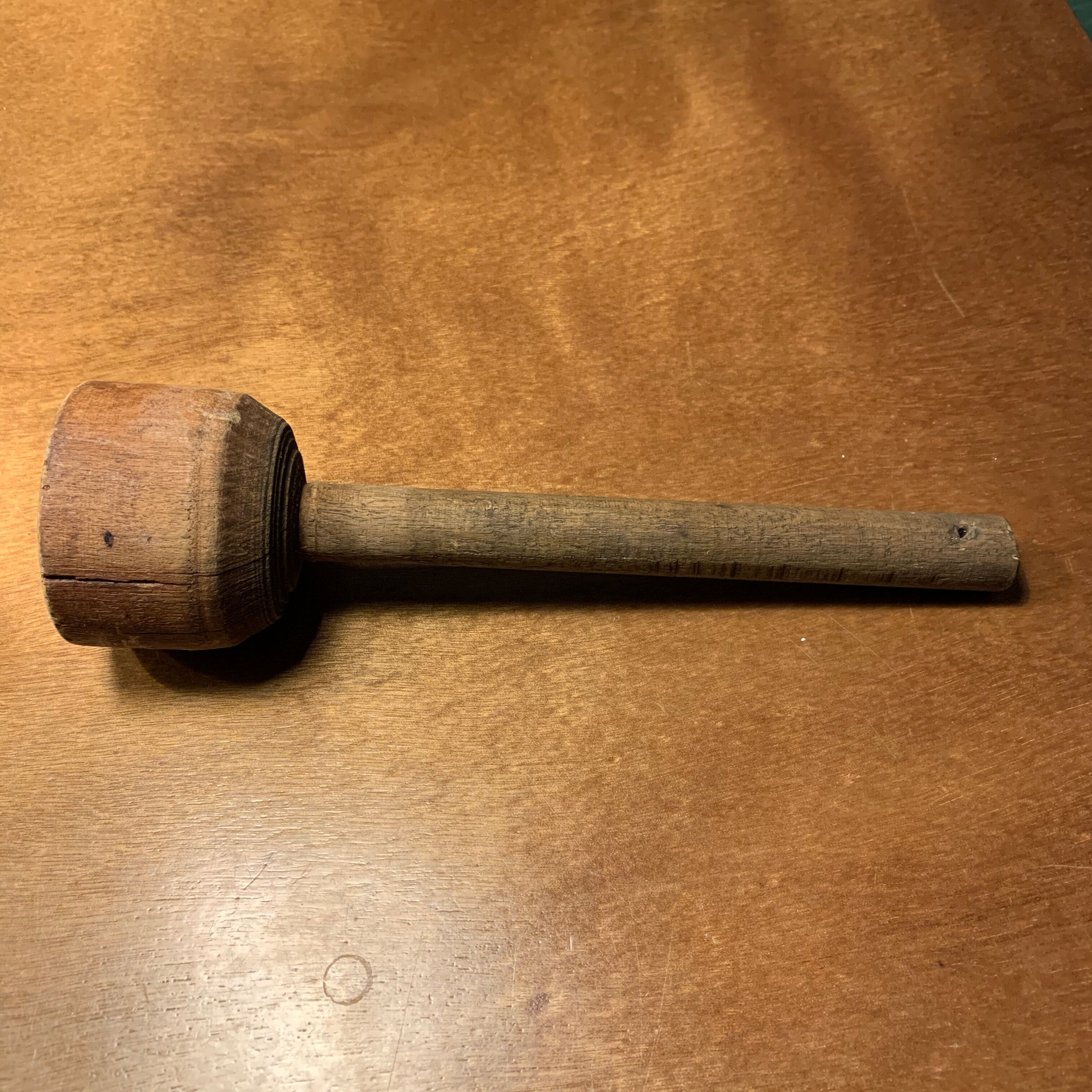 Old wooden pestle