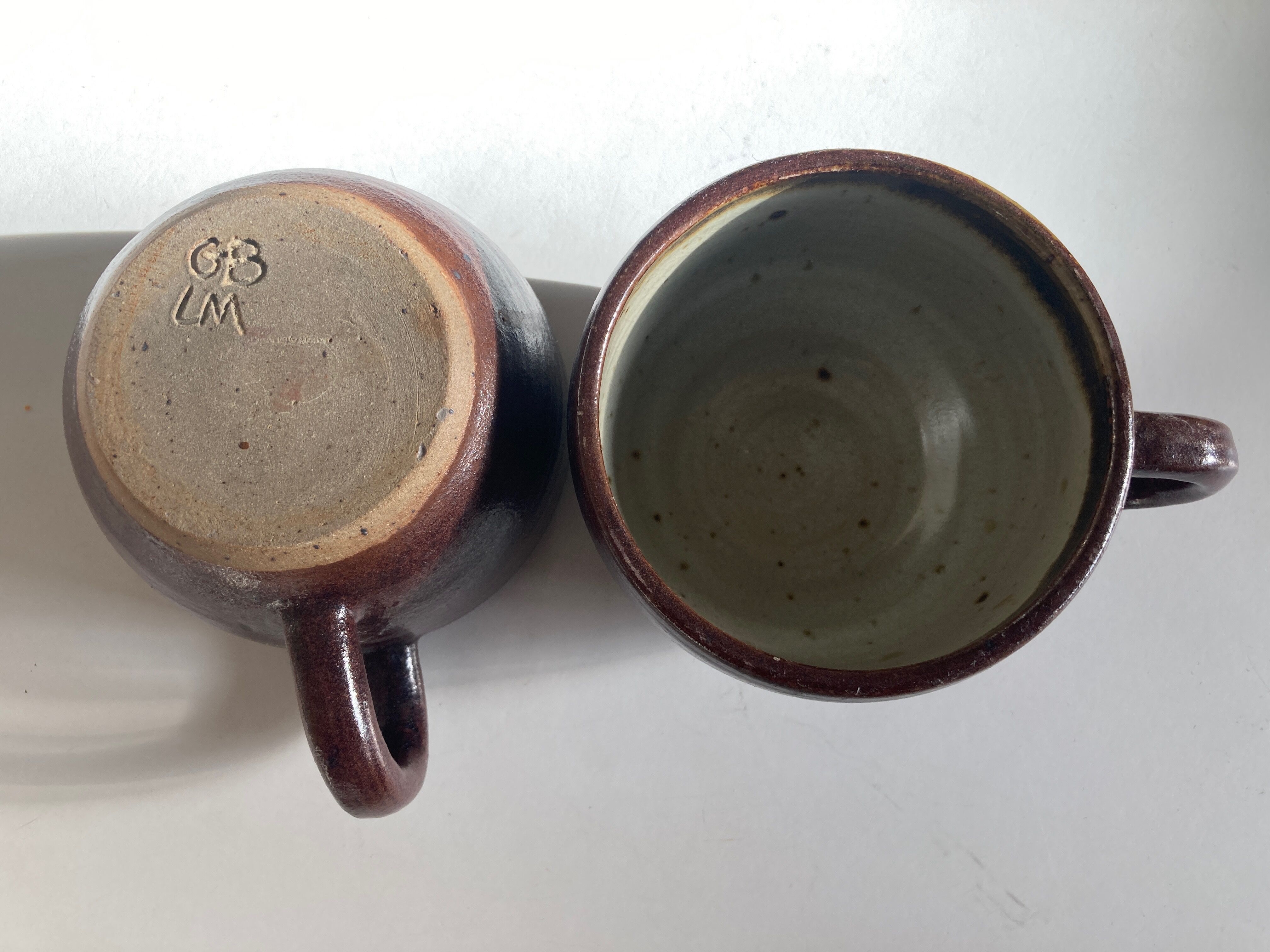 Pair of stoneware breakfast cups signed 1970