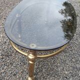 Table basse ovale en laiton doré et verre fumé 1970