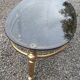 Oval coffee table in gilded brass and smoked glass 1970