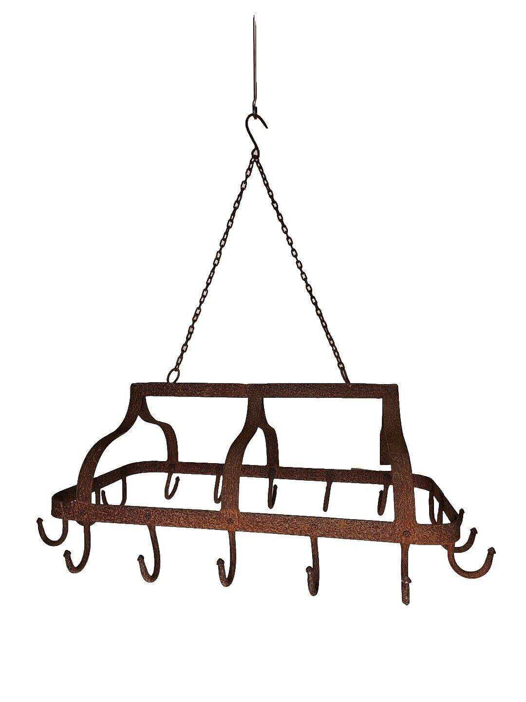 pig holder, wrought iron hook support