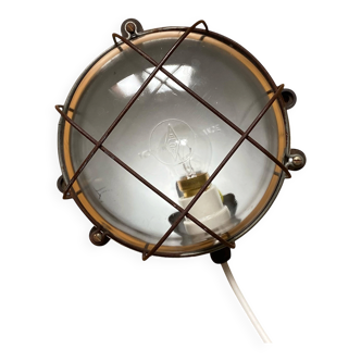 Waterproof industrial porthole light in Bakelite with a glass globe.