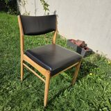 Scandinavian chair with faux leather seat and back