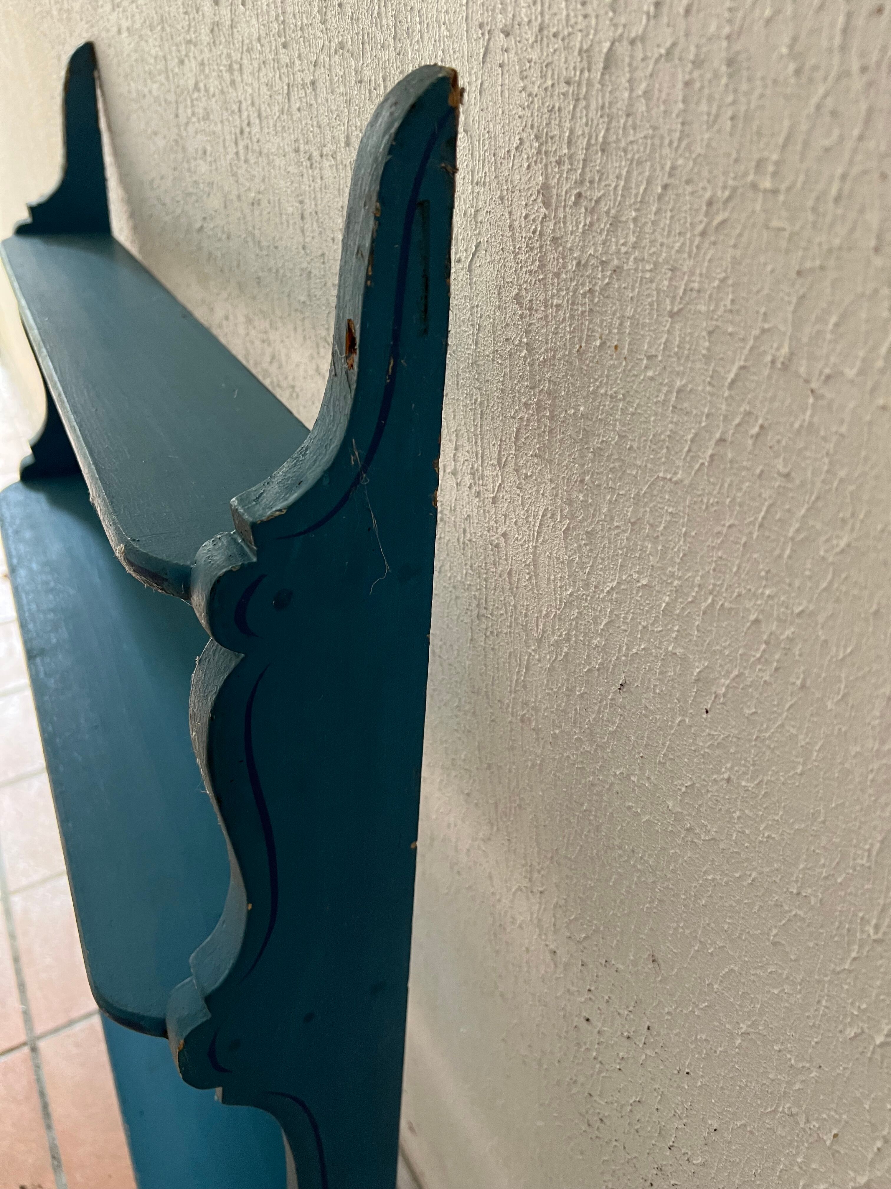 Blue wooden wall shelf