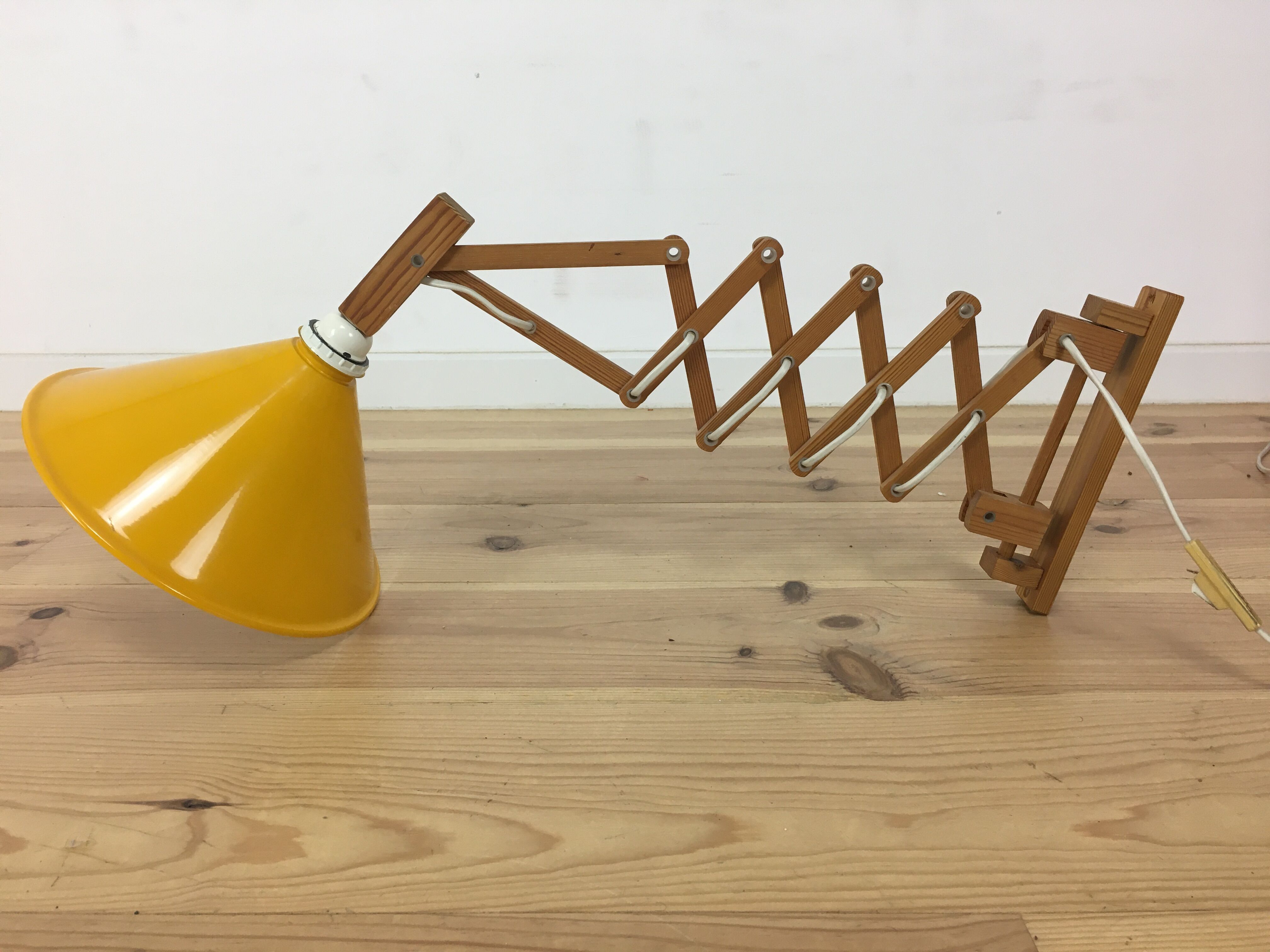 60s accordion sconce, pine, yellow metal reflector
