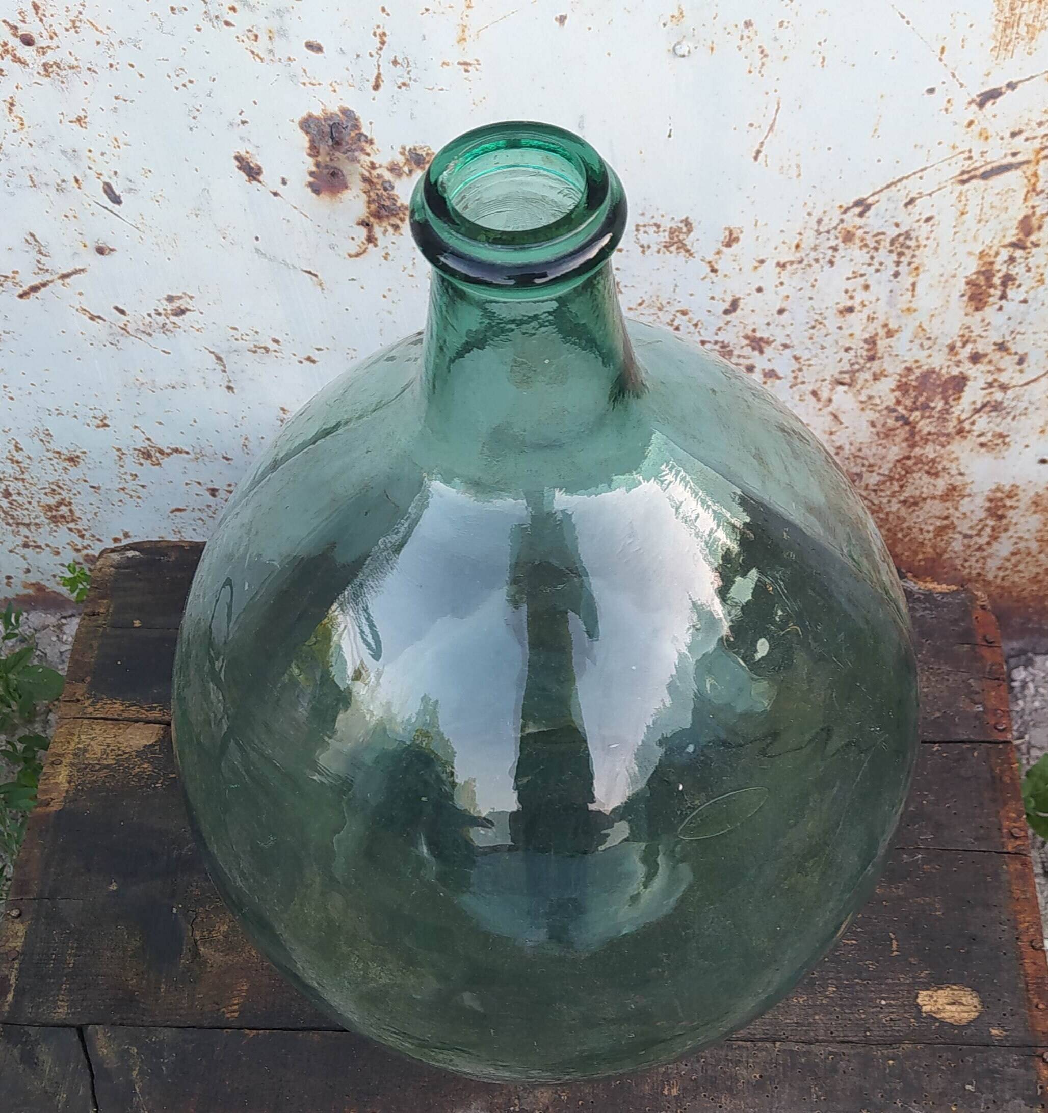 Give me an old green glass bottle jar.