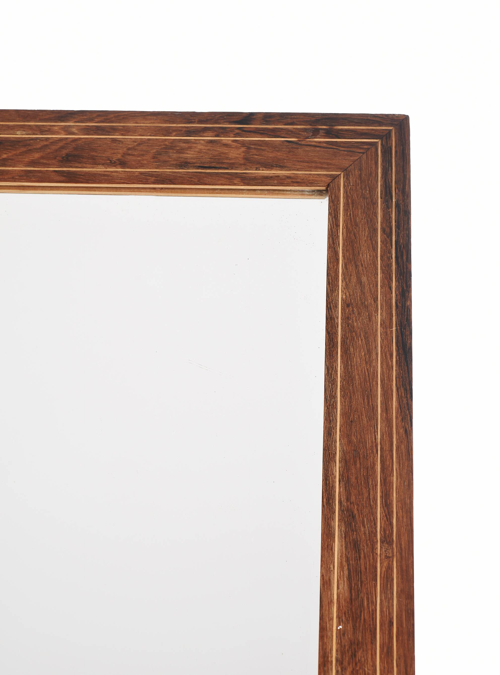 Old rectangular wooden mirror, frame decorated with edges