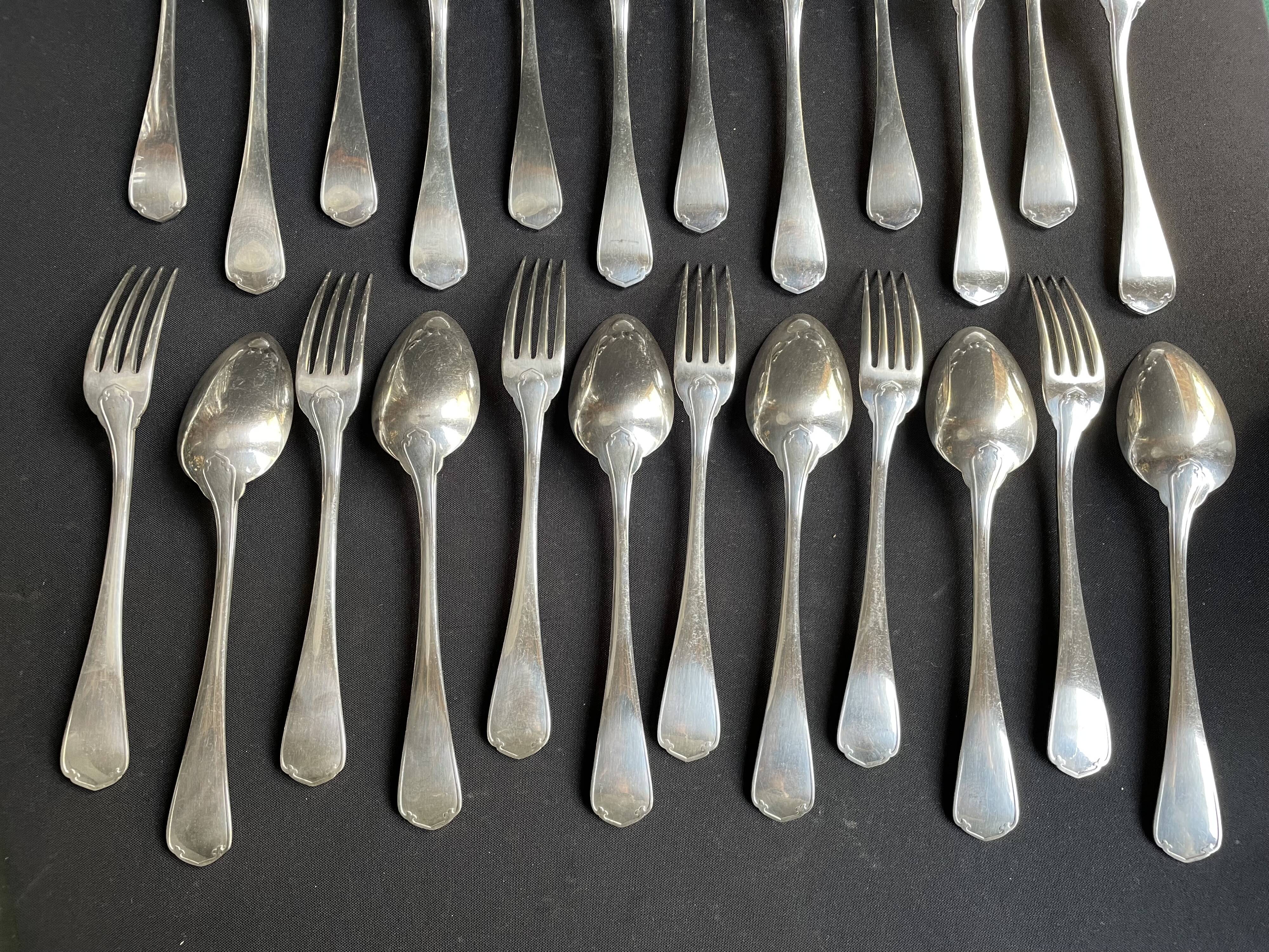 12 Christofle table forks and 12 spoons