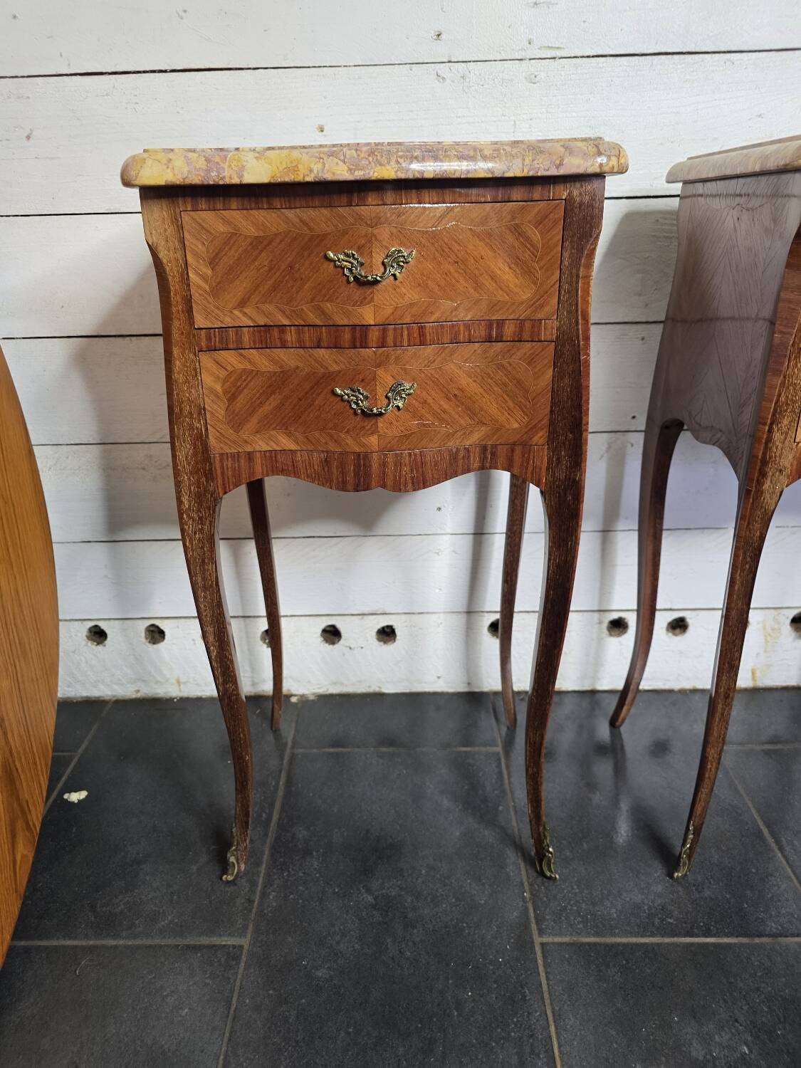 Pair of Louis XV style curved bedside tables in marquetry
