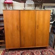 Vintage 60s/70s design wardrobe with compass feet.