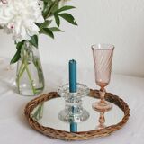 Decorative mirror tray surrounded by vintage rattan / wicker