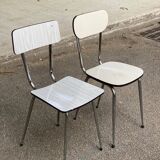 2 beige formica and steel chairs