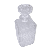 Antique whisky decanter made of chiseled glass